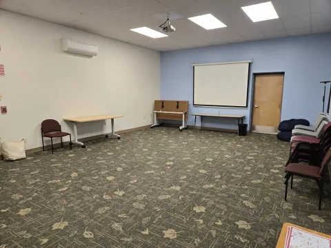 Community room has 4 tables with seating for 16. Maximum occupancy is 35.