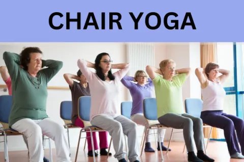 people over the age of 50, seated in chairs for chair yoga 