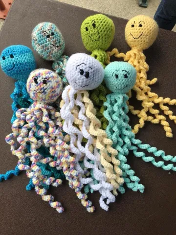 A group of crochet octopuses.